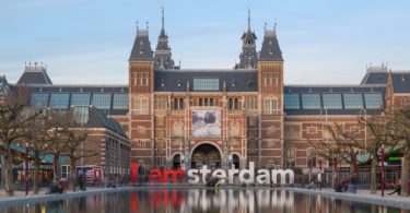 Blick auf den Stadtkern von Amsterdam mit dem Besuch im Wachsfigurenkabinett in Amsterdam